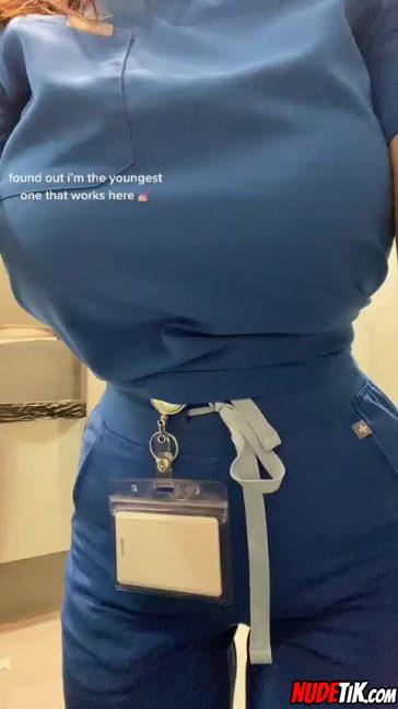 Busty 22 Year Old In Scrubs 001.jpeg